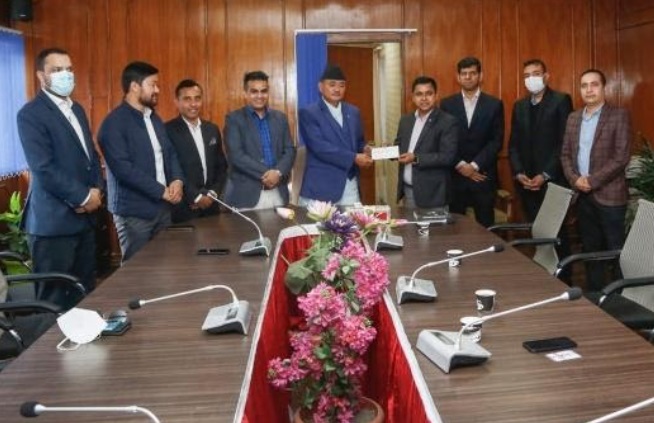 नाडाद्धारा ताप्लेजुङ्ग अग्नी पिडितलाई आर्थिक सहयोग